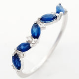 9K SOLID WHITE GOLD 0.60CT NATURAL MARQUISE BLUE SAPPHIRE RING WITH 6 DIAMONDS.