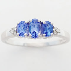 9K SOLID WHITE GOLD 0.60CT NATURAL TANZANITE TRILOGY RING WITH 6 DIAMONDS.