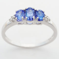 9K SOLID WHITE GOLD 0.60CT NATURAL TANZANITE TRILOGY RING WITH 6 DIAMONDS.