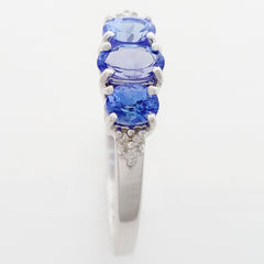 9K SOLID WHITE GOLD 0.60CT NATURAL TANZANITE TRILOGY RING WITH 6 DIAMONDS.