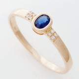 9K SOLID ROSE GOLD 0.20CT NATURAL OVAL BLUE SAPPHIRE RING WITH 8 DIAMONDS.