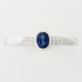 9K SOLID WHITE GOLD 0.25CT NATURAL OVAL BLUE SAPPHIRE RING WITH 8 DIAMONDS.