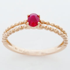 9K SOLID ROSE GOLD 0.25CT NATURAL RUBY RING WITH BEADED SHOULDERS.