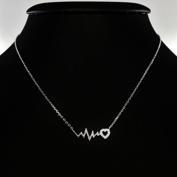 925 STERLING SILVER NECKLACE WITH EKG HEARTBEAT AND CRYSTAL LOVE-HEART PENDANT.
