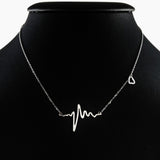 925 STERLING SILVER NECKLACE WITH SOLID SILVER EKG HEARTBEAT CHARM PENDANT.