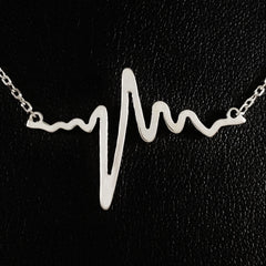 925 STERLING SILVER NECKLACE WITH SOLID SILVER EKG HEARTBEAT CHARM PENDANT.