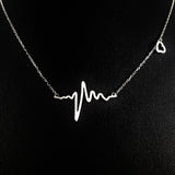 925 STERLING SILVER NECKLACE WITH SOLID SILVER EKG HEARTBEAT CHARM PENDANT.