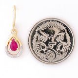 9K SOLID GOLD 0.55CT NATURAL RUBY EARRINGS WITH FOUR DIAMONDS.