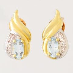 9K SOLID GOLD 0.65CT SKY BLUE TOPAZ AND DIAMOND STUD EARRINGS.