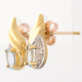 9K SOLID GOLD 0.65CT SKY BLUE TOPAZ AND DIAMOND STUD EARRINGS.