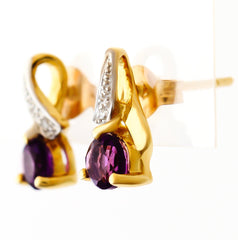 9K SOLID GOLD 0.92CT AMETHYST AND DIAMOND STUD EARRINGS.