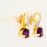9K SOLID GOLD 0.92CT AMETHYST AND DIAMOND STUD EARRINGS.