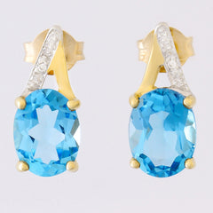 9K SOLID GOLD 3.10CT SWISS BLUE TOPAZ AND DIAMOND EARRINGS.