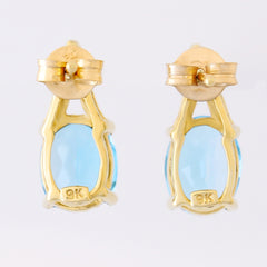 9K SOLID GOLD 3.10CT SWISS BLUE TOPAZ AND DIAMOND EARRINGS.