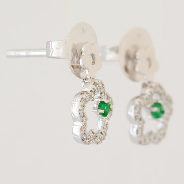 9K SOLID WHITE GOLD FLORAL INSPIRED NATURAL EMERALD EARRINGS WITH 40 DIAMONDS.