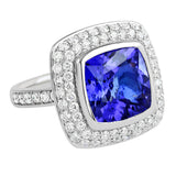 18K SOLID WHITE GOLD 6.52CT NATURAL TANZANITE RING WITH 68 VS/G DIAMONDS.