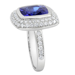 18K SOLID WHITE GOLD 6.52CT NATURAL TANZANITE RING WITH 68 VS/G DIAMONDS.