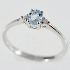 9K SOLID WHITE GOLD 0.30CT NATURAL OVAL AQUAMARINE RING WITH 2 DIAMONDS.