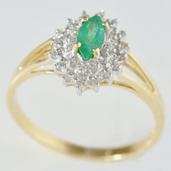 9K SOLID GOLD VINTAGE INSPIRED 0.25CT MARQUISE EMERALD RING WITH 28 DIAMONDS.