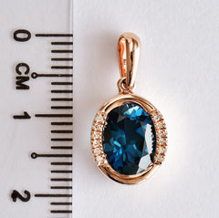9K SOLID ROSE GOLD 1.90CT LONDON BLUE TOPAZ  PENDANT WITH TWELVE  DIAMONDS.