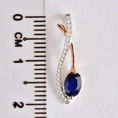 9K SOLID WHITE & ROSE GOLD 0.60CT NATURAL SAPPHIRE PENDANT WITH TWENTY ONE DIAMONDS.